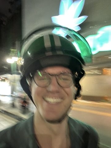 Ryker on motorbike at night