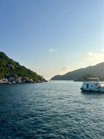 Rocky cove with boat