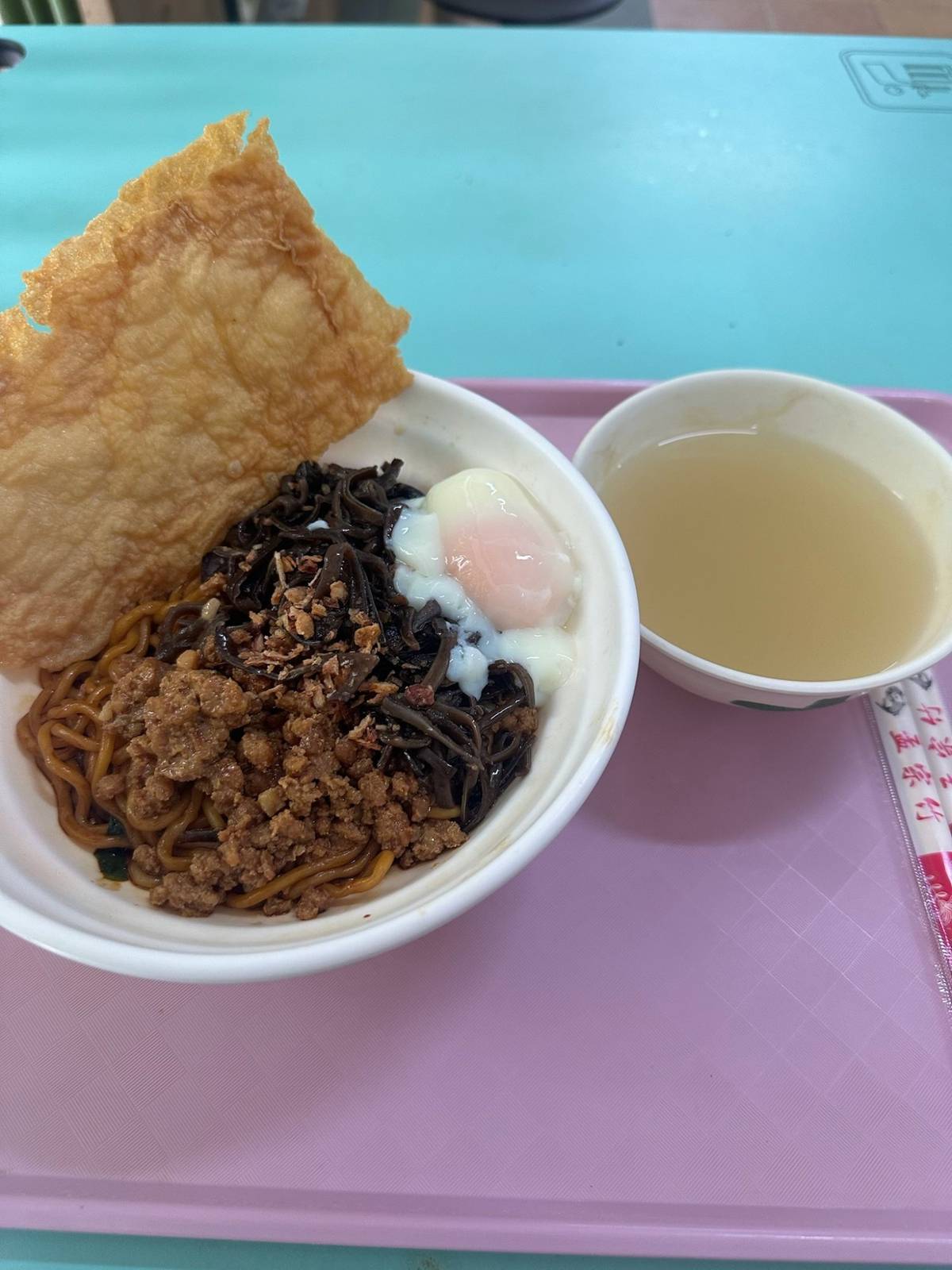 Handmade dry noodles with pork sauce