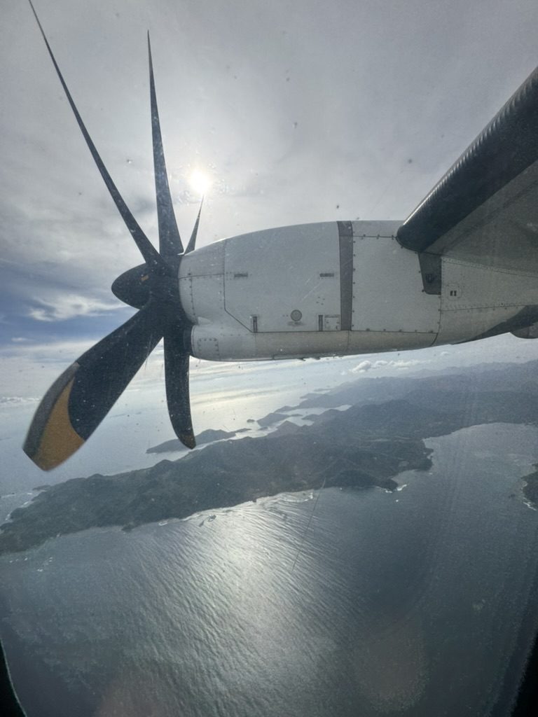 View of Palawan islands from the window of a Cebu Pacific propeller plane