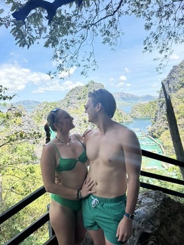 Meg and Ryker at the Kayangan Lake viewpoint overlooking karst limestone islands and fish farms