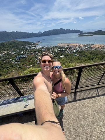 Ryker and Meg selfie at the hilltop overlook above Coron town and bay