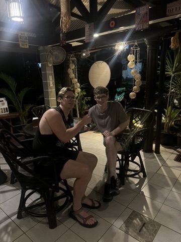 Ryker and Miles at the Palawan Brewery at night