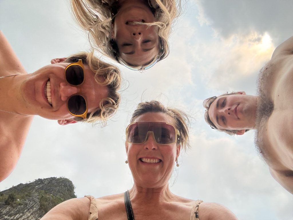 Group looking-down selfie at Ha Long Bay