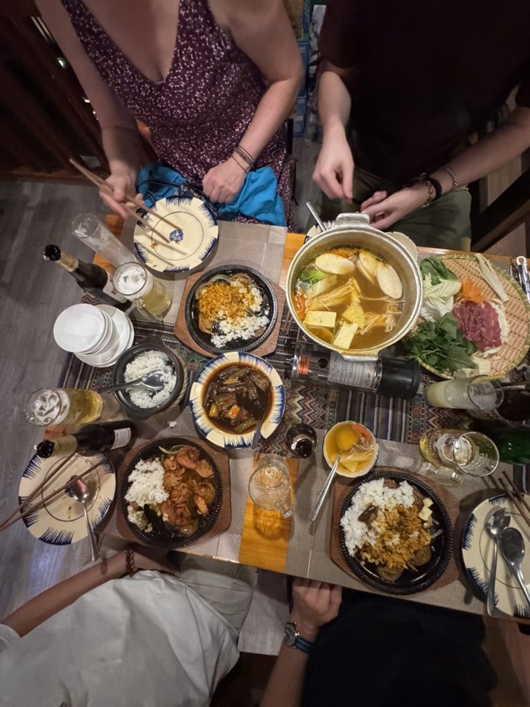 Overhead shot of the Hanoi group dinner spread