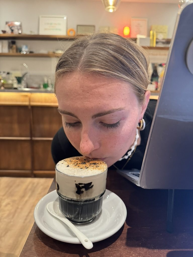 Meg face-planting into her sesame latte
