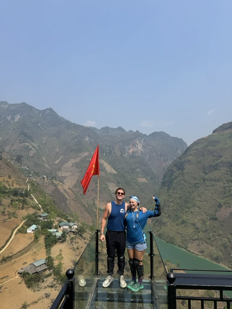 Ryker and Meg on the Ha Giang glass platform overlooking the Nho Que river