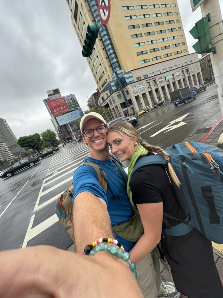 Ryker and Meg selfie in rainy Taipei