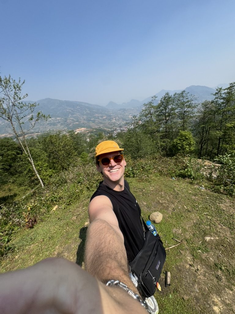 Ryker selfie on the Sapa Sisters hike with valley views