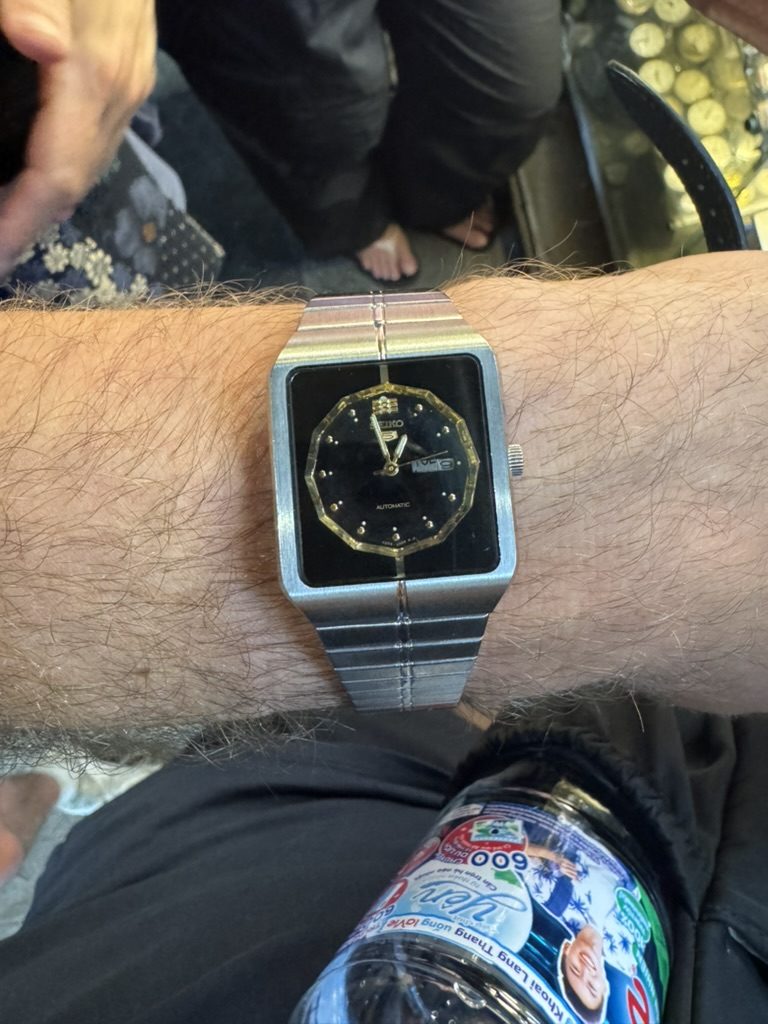 Ryker wearing a vintage Seiko 5 automatic found in Hanoi