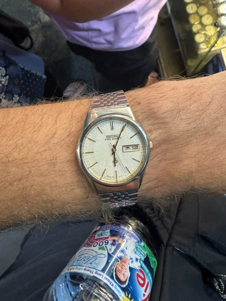 Ryker wearing a vintage Seiko King Quartz he found in Hanoi