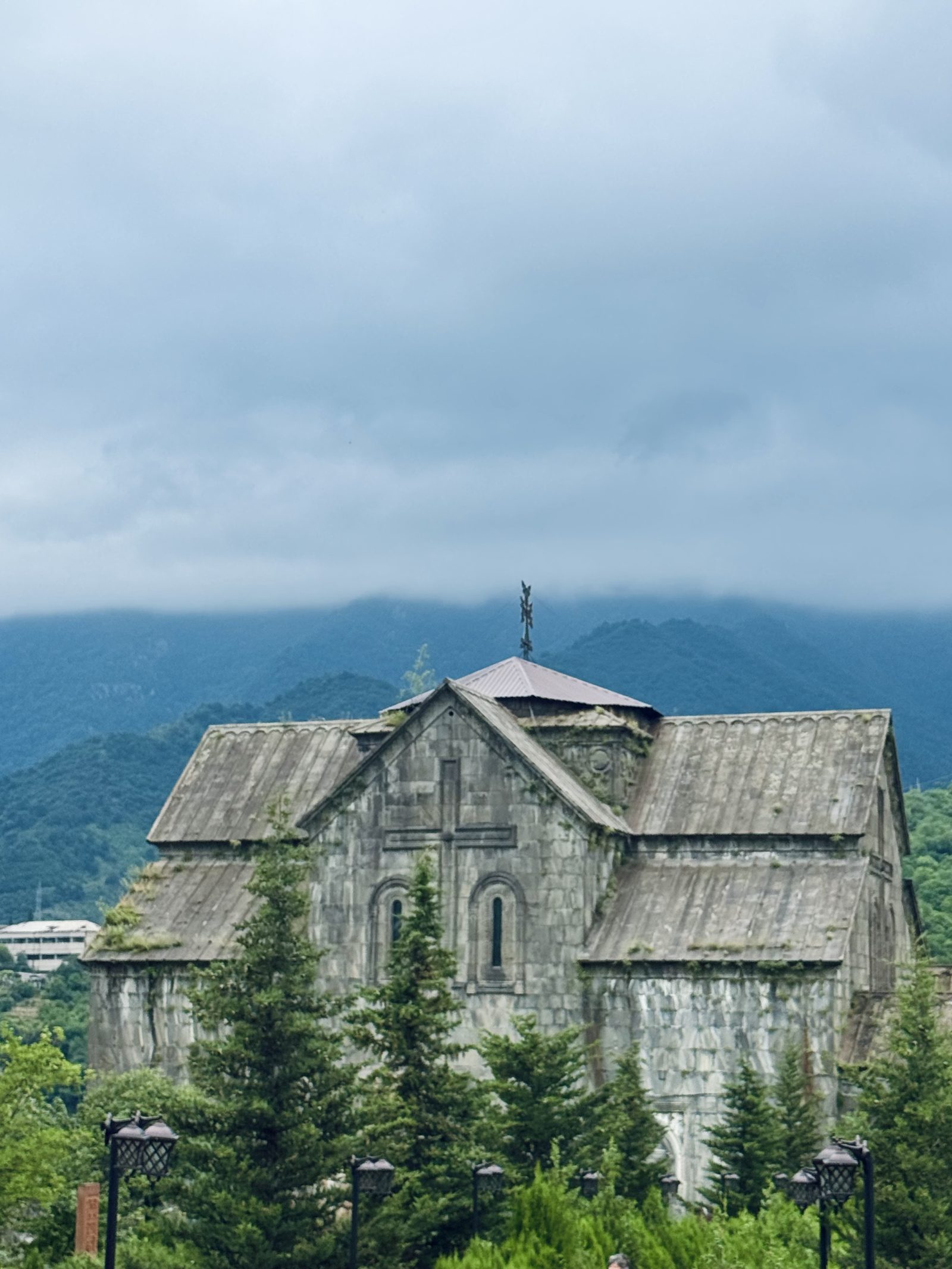 A grey stone monastery on the drive into Armenia