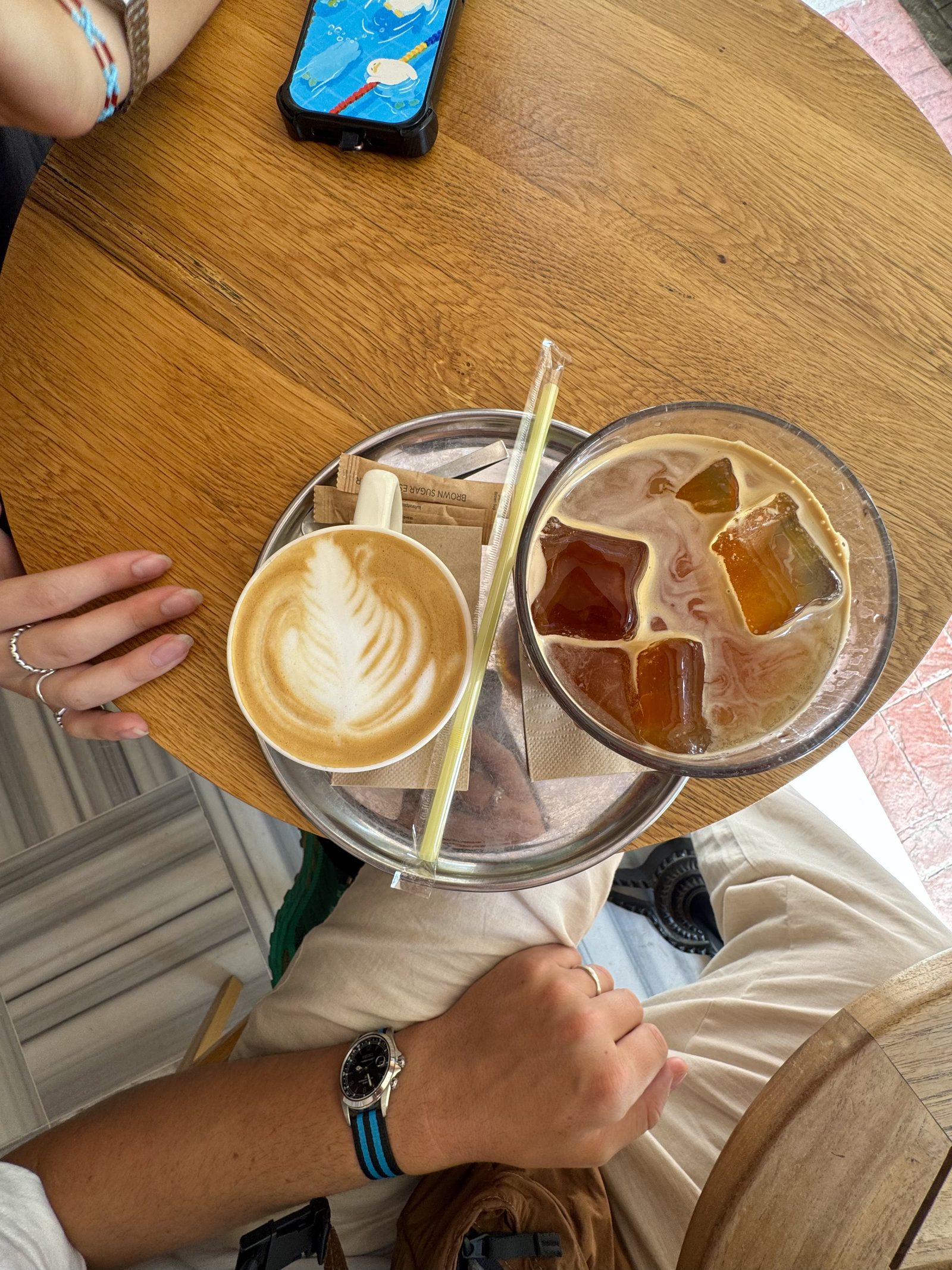 Turkish coffee and iced drinks on a cafe table