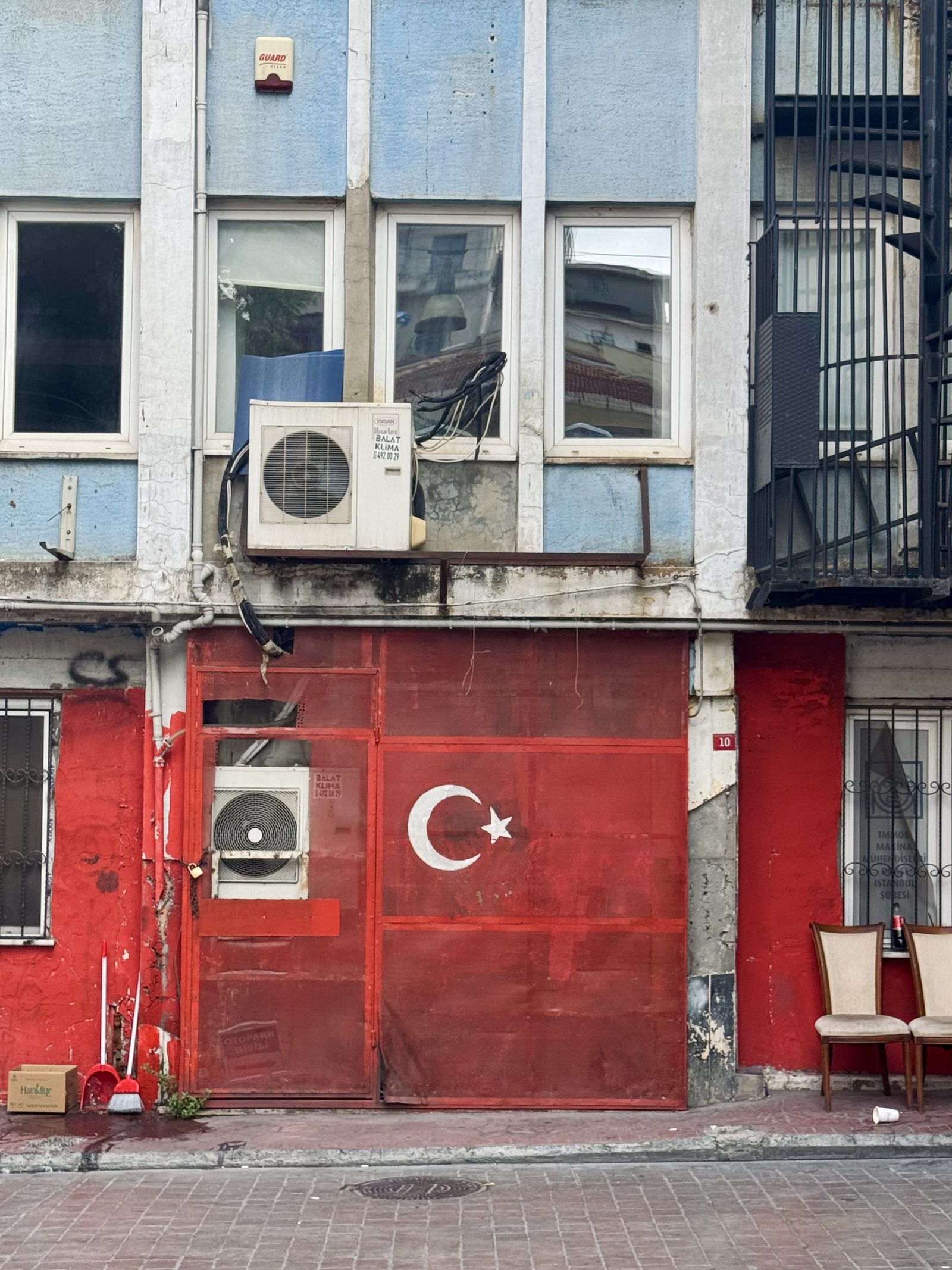 A red building painted with the Turkish flag in Istanbul