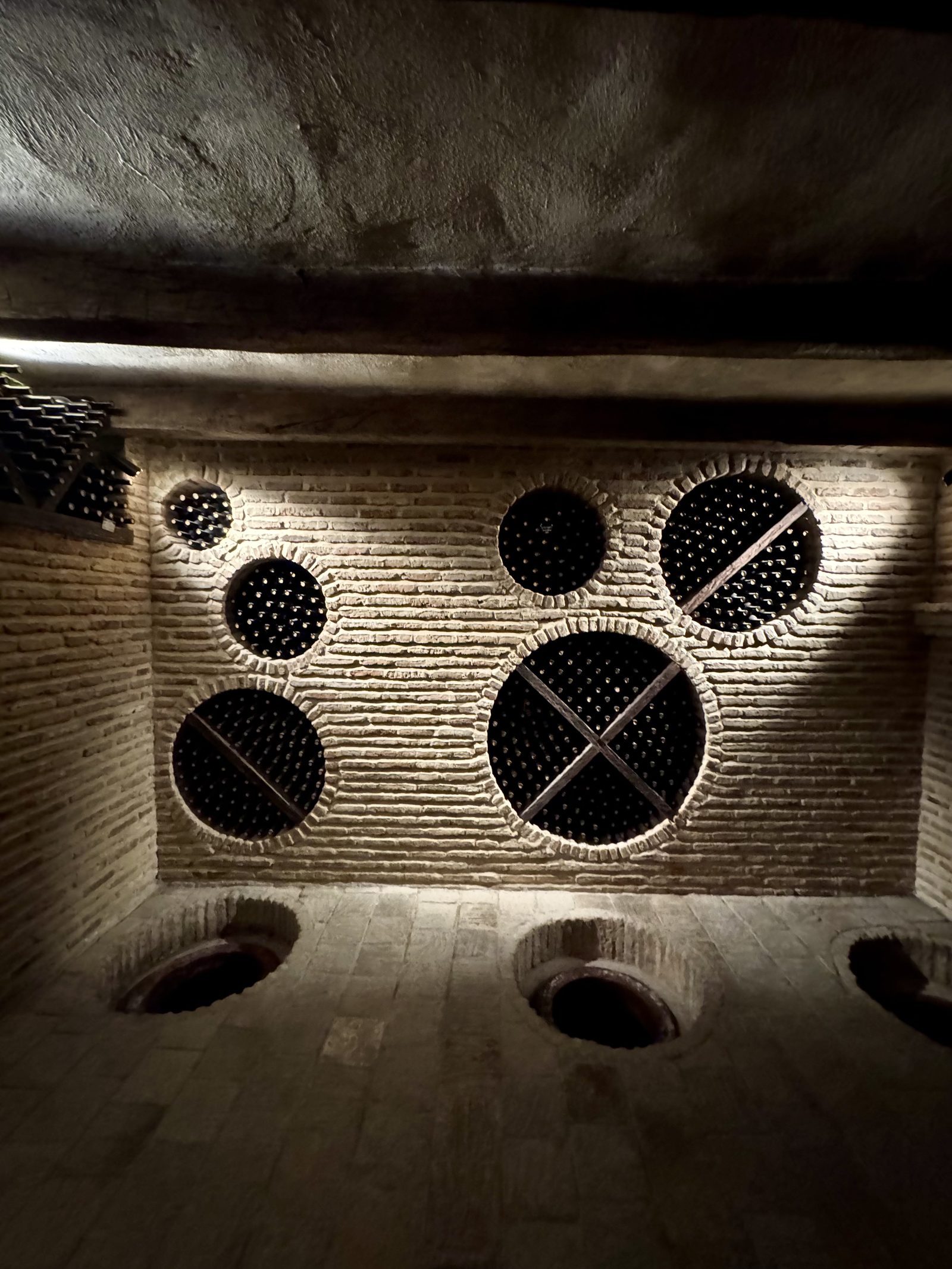 Looking down into a qvevri clay-vessel wine cellar
