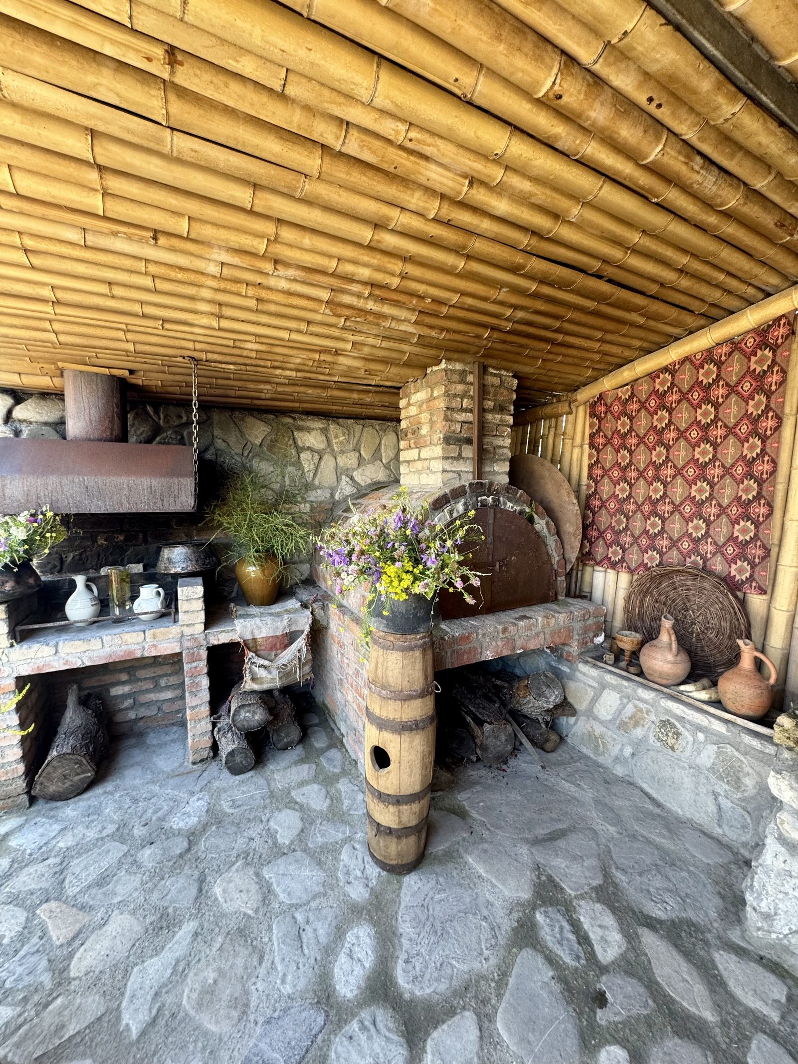 The stone hearth and qvevri in a Georgian family home