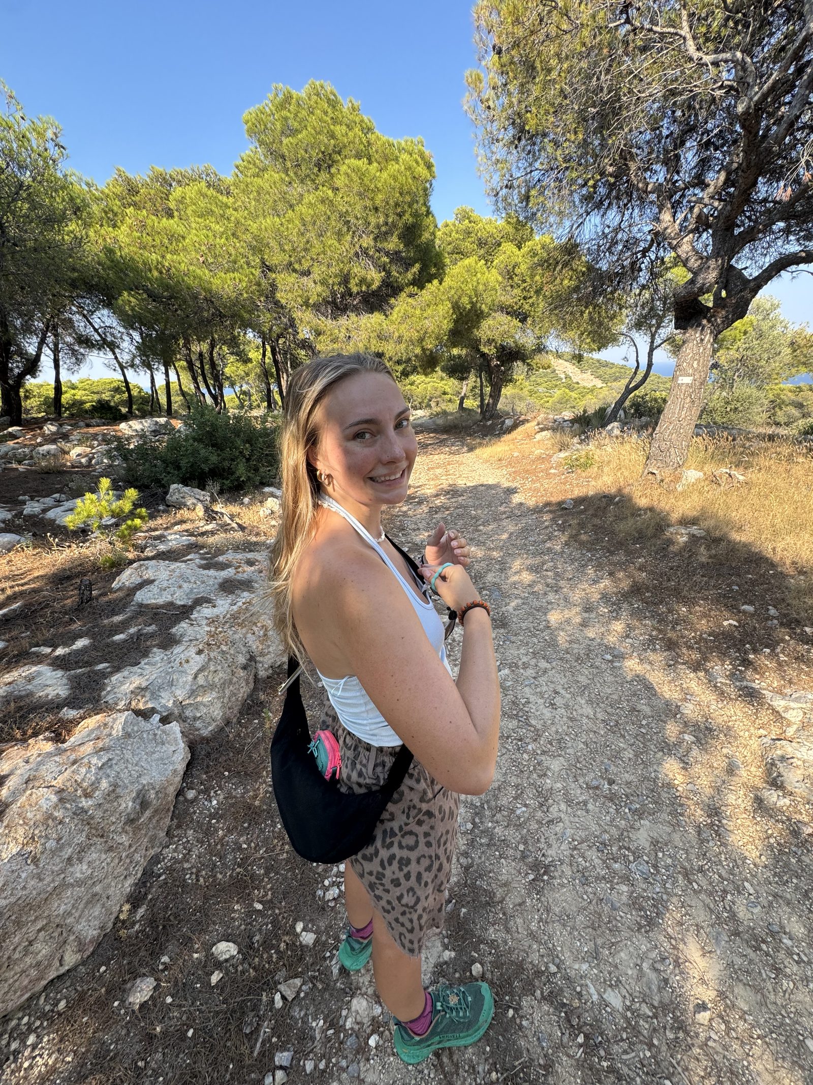 Meg on a walk with her black sling bag