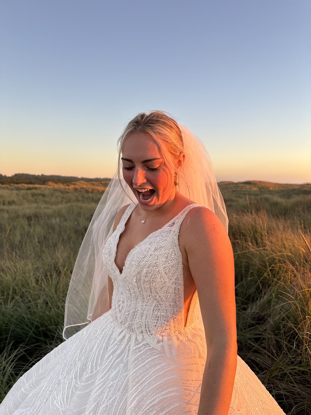 Meg laughing at sunset
