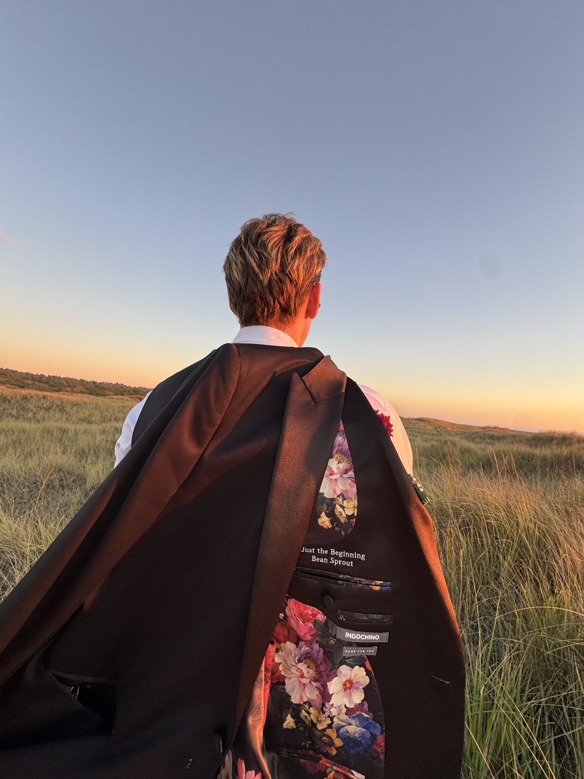 Ryker's suit jacket at sunset